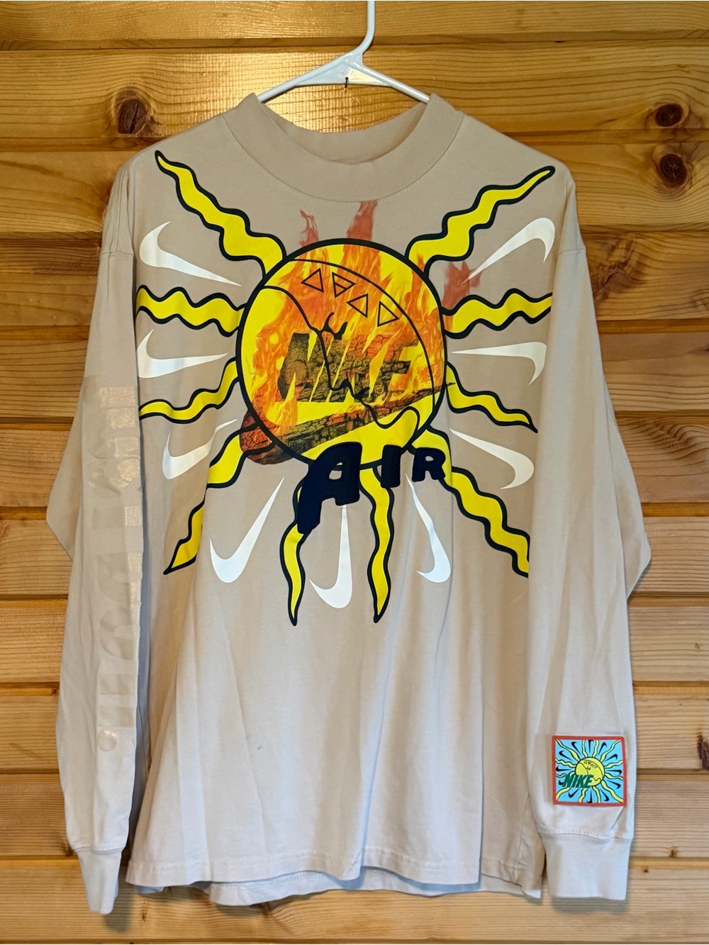 Nike Air JDI Travis Scott Beige Long-Sleeve Tee with Yellow Sun Graphic